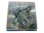 German WWII die-cast model aircraft in camouflage packaging