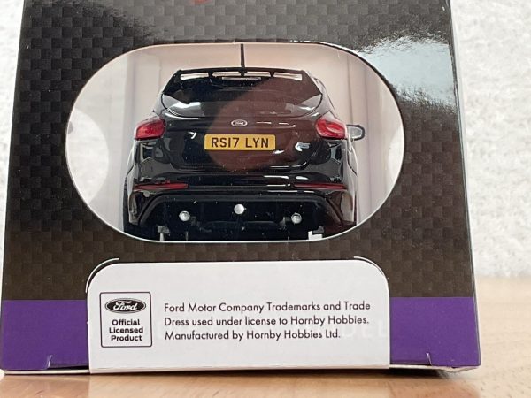 Rear view of black Ford Focus RS die-cast model in Corgi packaging