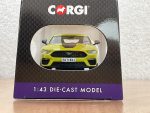 Front view of 1:43 scale Corgi die-cast Ford Mustang Mach 1 in lime green with EO71 BXJ plate in display packaging
