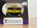 Rear view of lime green Ford Mustang Mach 1 die-cast model in box with E071 BXJ plate