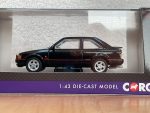 Side view of black Ford Escort XR3i 1:43 die-cast model in Corgi display box
