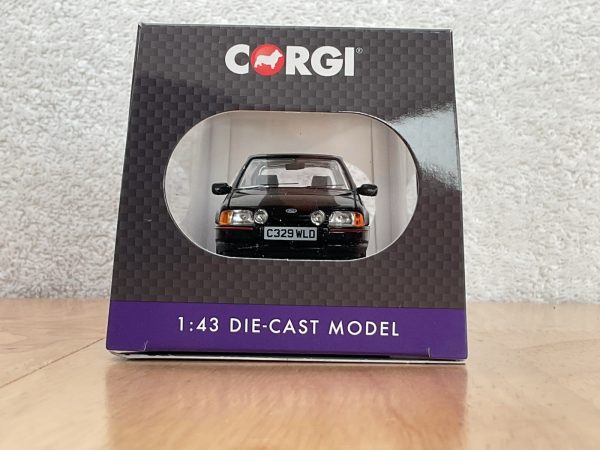 Front view of 1:43 Corgi die-cast Ford Escort XR3i model in box