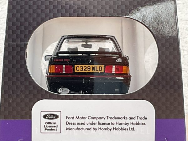 Rear view of a black die-cast Ford Escort XR3i model with UK plate C329 WLD