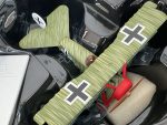 Close-up of Fokker Dr.1 Triplane die-cast model in packaging with green and red detailing
