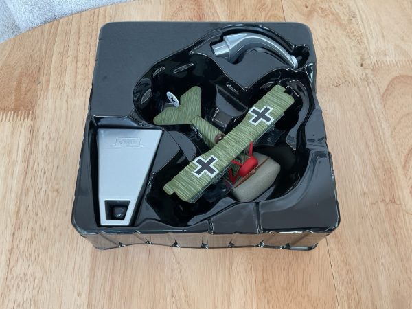 Fokker Dr.1 Triplane die-cast model in packaging with display stand
